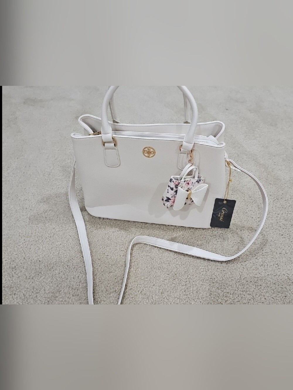 New With Tag! Elegant White Womens Bag with Floral Bow Charm.I accept offers.